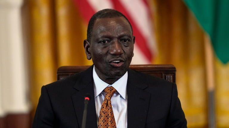 Kenya's President William Ruto speaks during meeting with President and...