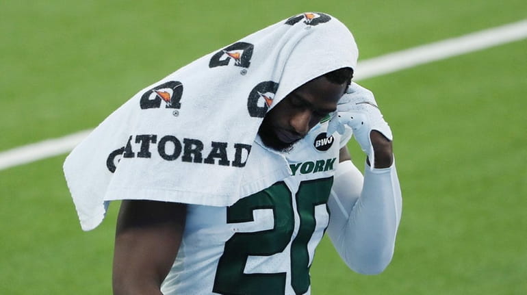 Marcus Maye #20 of the Jets reacts after the Jets'...