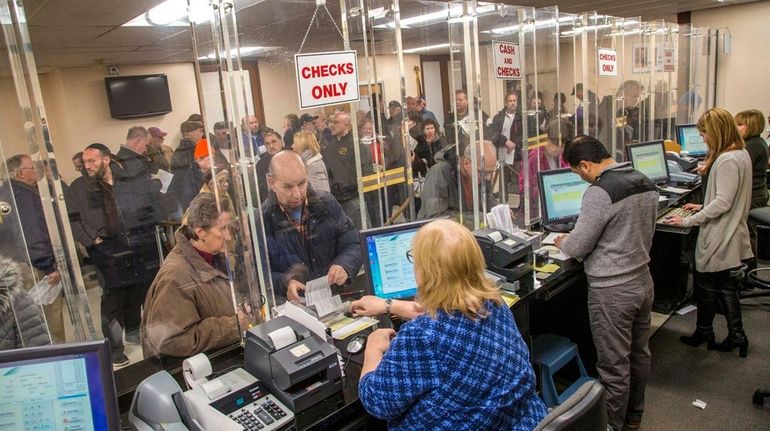 Town of Hempstead residents line up to prepay their 2018...