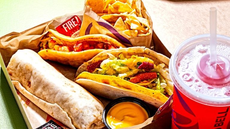 Taco Bell's Luxe Cravings Box features a Chalupa supreme, beefy five-layer...