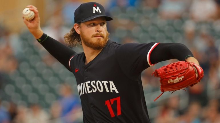 Minnesota Twins starting pitcher Bailey Ober throws to the Philadelphia...