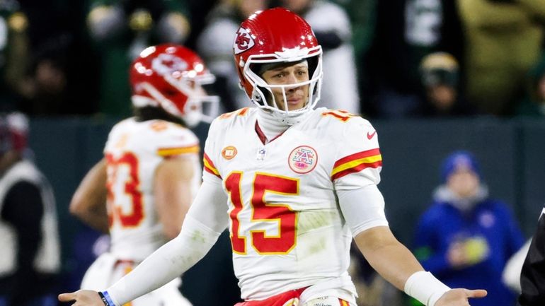 Kansas City Chiefs quarterback Patrick Mahomes (15) questions a call...