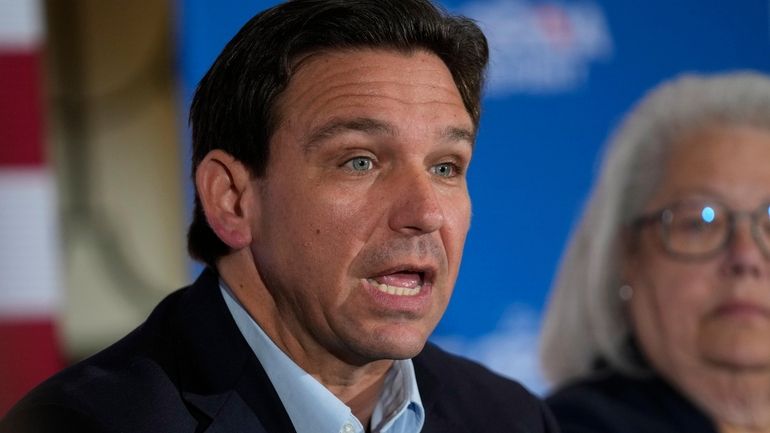 Florida Gov. Ron DeSantis speaks at a political roundtable, Friday,...