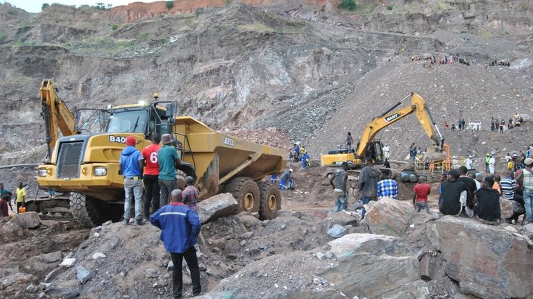 Machinery and people are seen during a mine rescue mission...