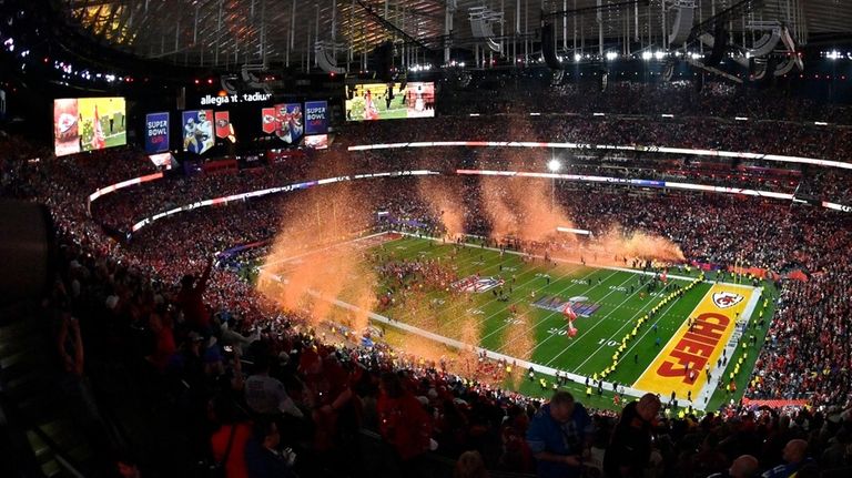 Kansas City Chiefs celebrate after their win against the San...