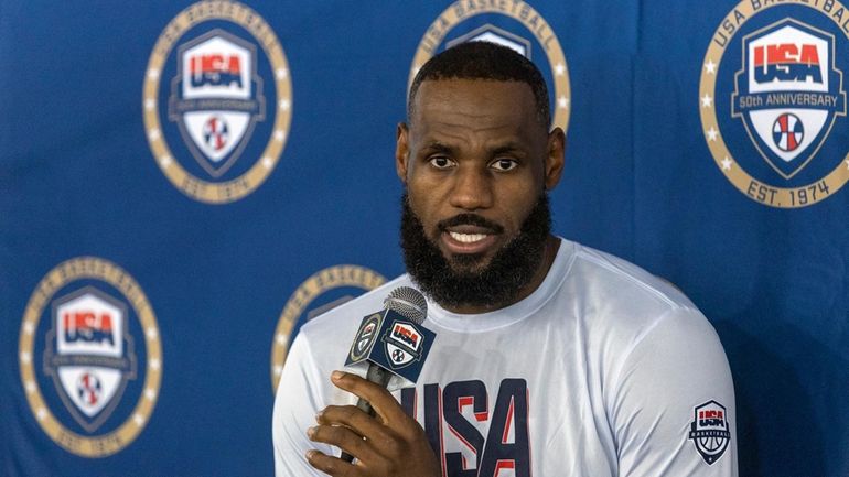 LeBron James, of the Los Angeles Lakers, responds to a...