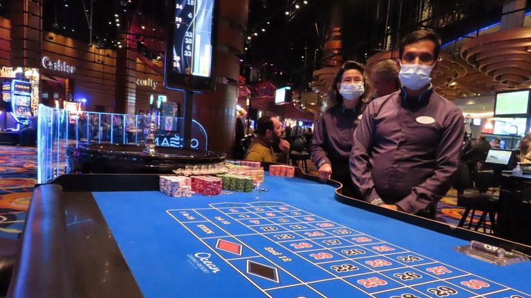 Roulette dealers wearing face masks at the Ocean Casino Resort...