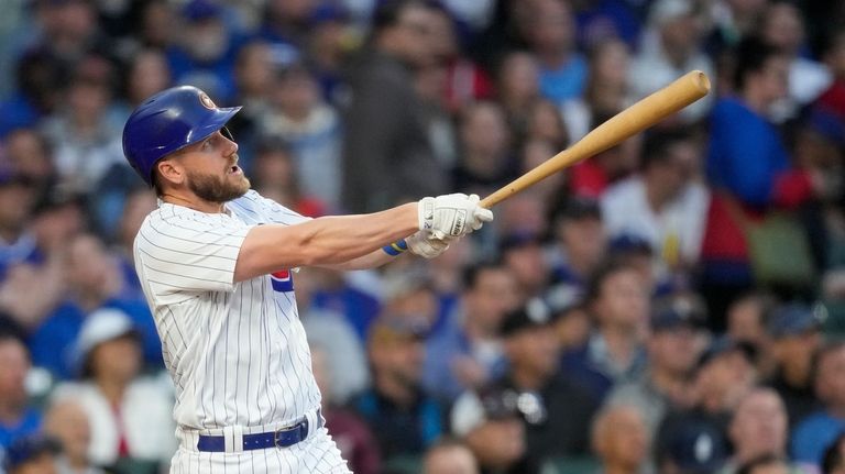 Chicago Cubs' Patrick Wisdom after hitting a two-run home run