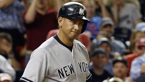 Alex Rodriguez reacts after he struck out during the ninth...