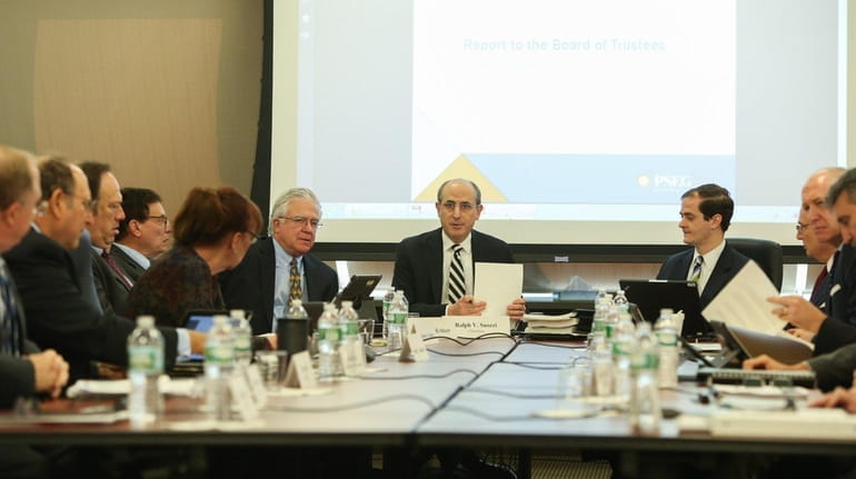 LIPA Board of Trustees Chairman Ralph Suozzi, center, leads a...