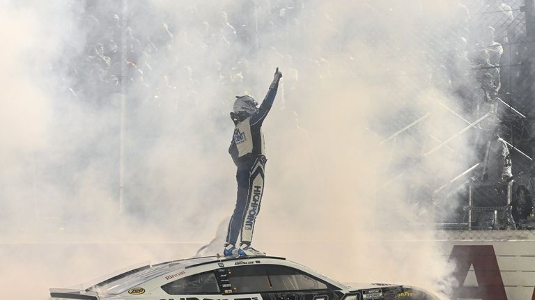 Chase Briscoe celebrates after winning a NASCAR Cup Series auto...