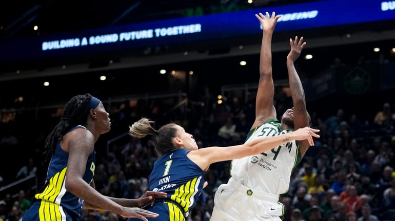 Seattle Storm guard Jewell Loyd (24) goes up to the...