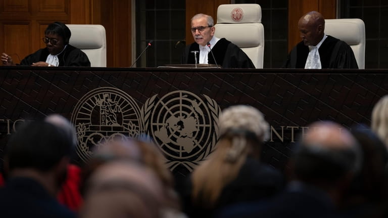 Presiding Judge Nawaf Salam reads the ruling of the International...