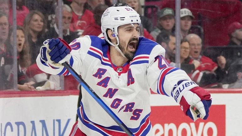 Chris Kreider of the Rangers celebrates a goal against the Hurricanes...