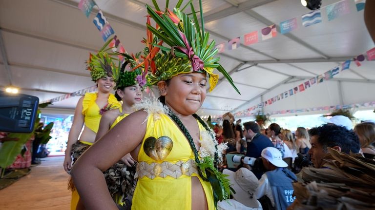 Dancers leave after a performance during an opening ceremony for...