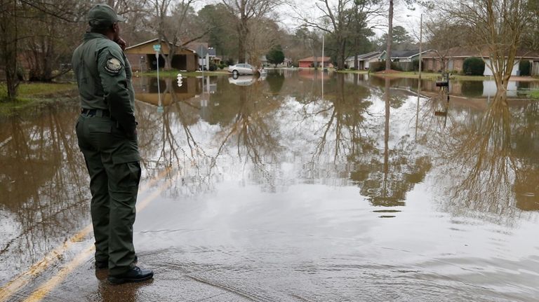 FILE-An officer from the Mississippi Department of Wildlife, Fisheries and...