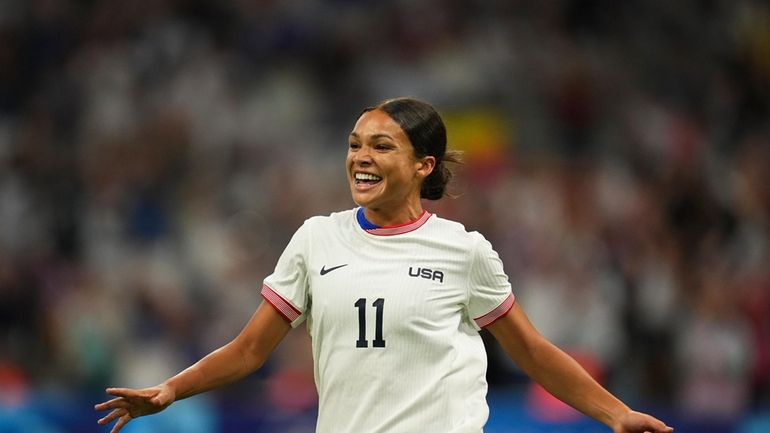 United States' Sophia Smith celebrates after scoring her side's first...