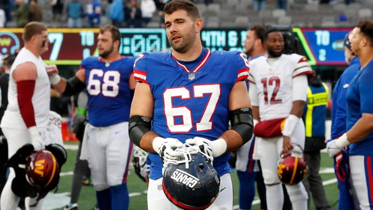 Justin Pugh #67 of the New York Giants looks on...