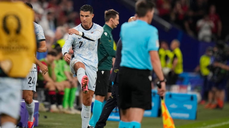 Portugal's Cristiano Ronaldo reacts after leaving the pitch during a...