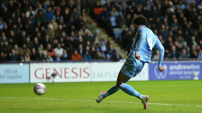 Coventry City's Ellis Simms scores their side's third goal of...
