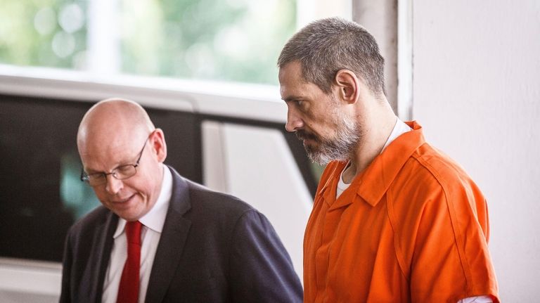 Casey White, right, arrives at the Lauderdale County Courthouse for...