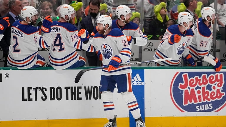 Edmonton Oilers right wing Connor Brown is congratulated for his...