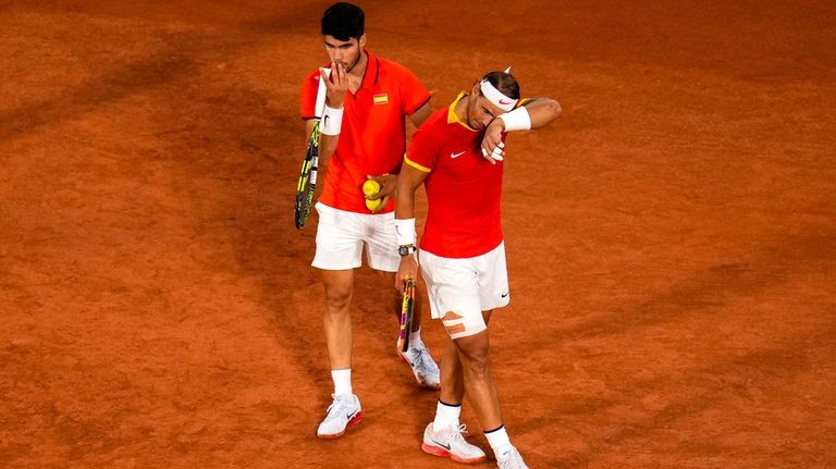 Carlos Alcaraz, left, and Rafael Nadal from the Spanish team...