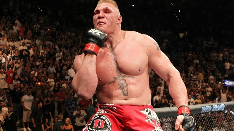 Brock Lesnar reacts after his second round submission victory against...