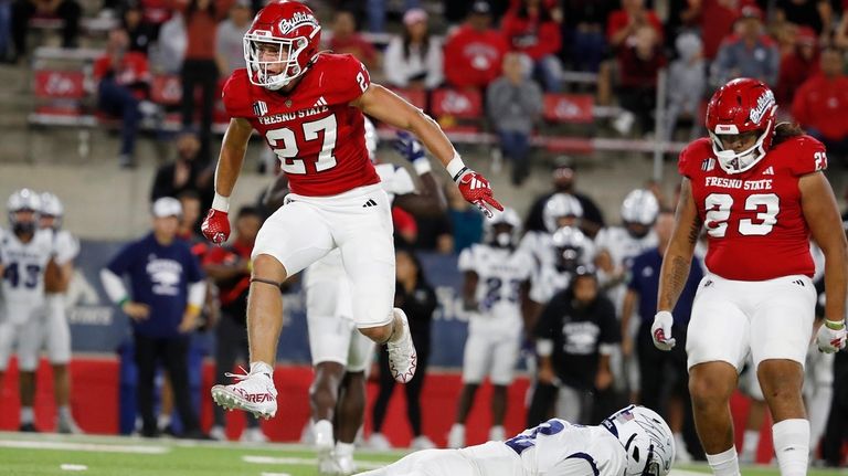 Fresno State defensive back Camryn Bracha celebrates a sack against...