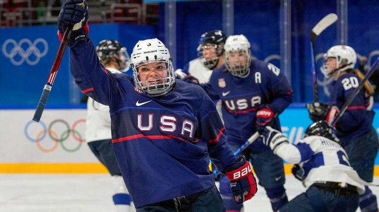 FILE -United States' Cayla Barnes (3) celebrates after scoring a...