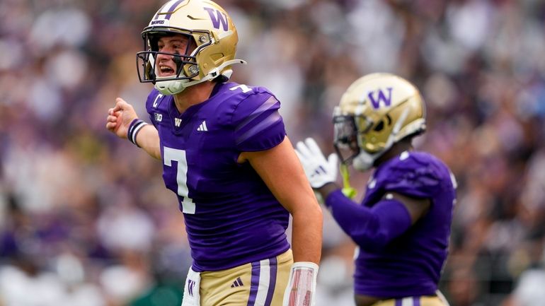 Washington quarterback Will Rogers (7) reacts during the first half...