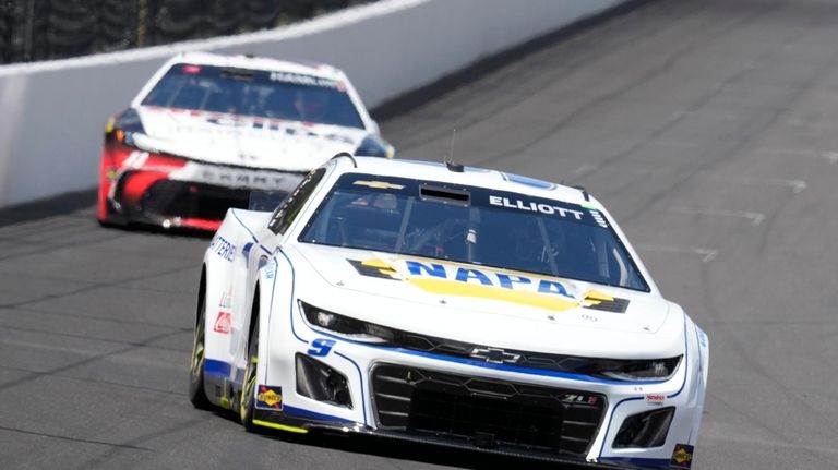 Chase Elliott drives into a turn during a practice session...