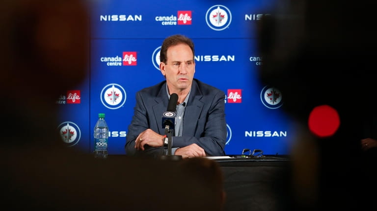 Winnipeg Jets head coach Scott Arniel speaks to media at...