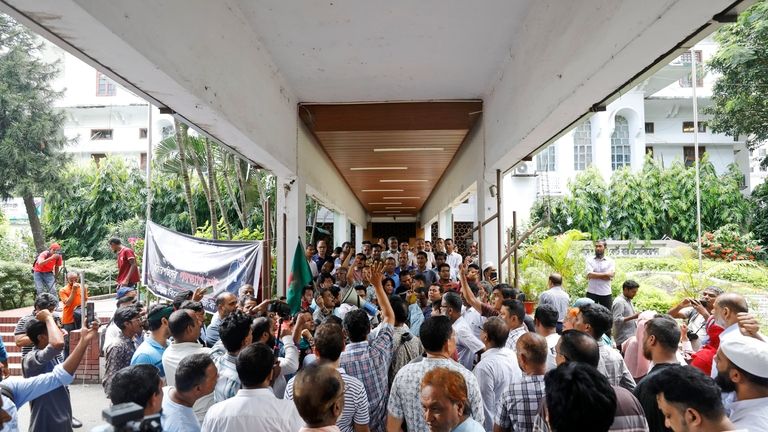 Lawyers protest as they gather in the court premises demanding...