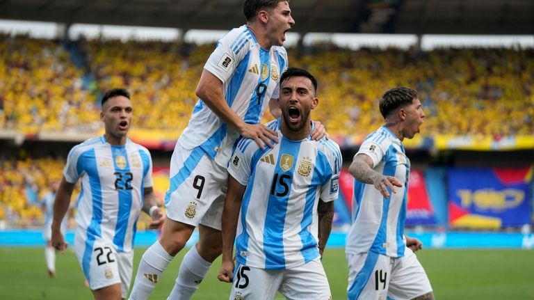 Argentina's Nicolas Gonzalez (15) celebrates scoring his side's first goal...