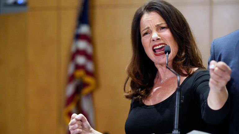 SAG-AFTRA President Fran Drescher describes negotiations during a news conference...