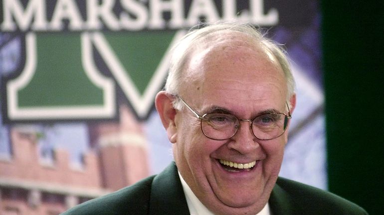 Bob Marcum laughs during a press conference, May 21, 2002...