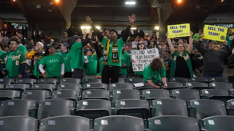 A's met by fans in Oakland with chants of `Sell the team!' - Newsday