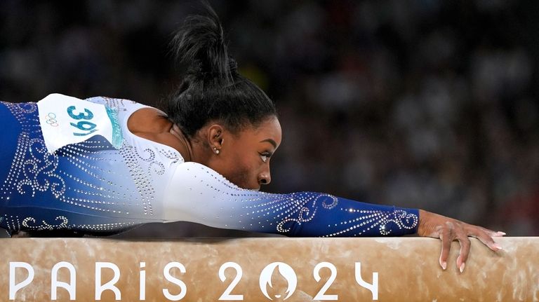 Simone Biles, of the United States, competes during the women's...