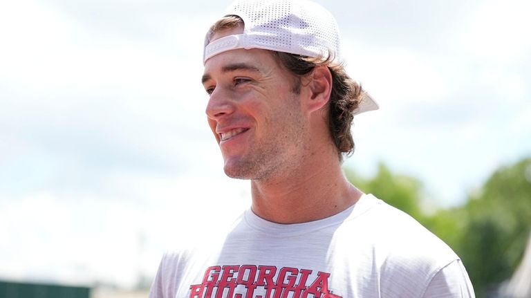 Georgia's Charlie Condon speaks to the media before an NCAA...