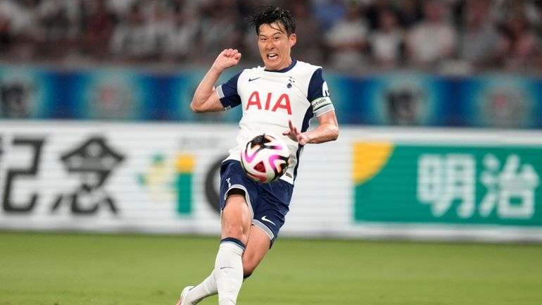 Tottenham's Son Heung-min makes a goal during the second half...