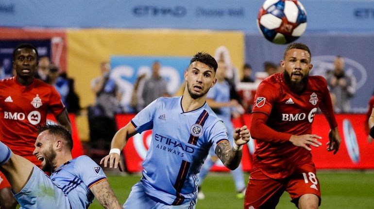 New York City FC's Valentin Castellanos and Toronto FC's Nick...