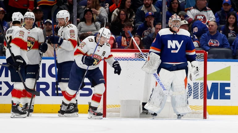 Semyon Varlamov of the Islanders looks on after surrendering a...