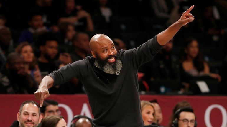 Jacque Vaughn of the Nets reacts during the first quarter...