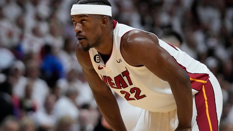 Miami Heat forward Jimmy Butler (22) looks up during the...