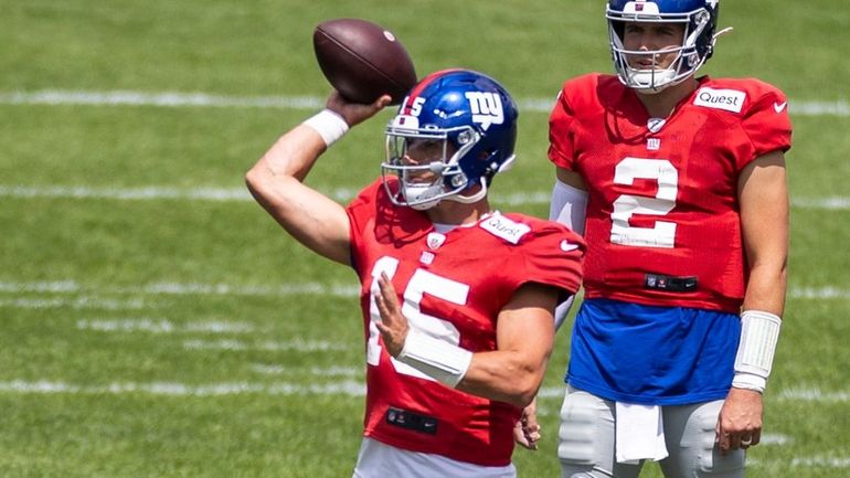 Giants quarterback Tommy DeVito throws during a joint practice with...