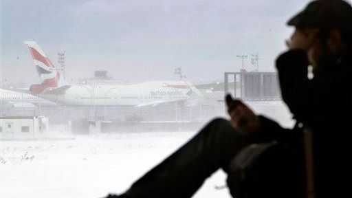 Kevin Fagan, from San Francisco, talks on his phone while...