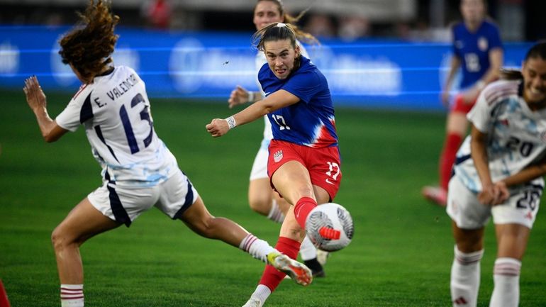 United States midfielder Sam Coffey (17) kicks the ball against...