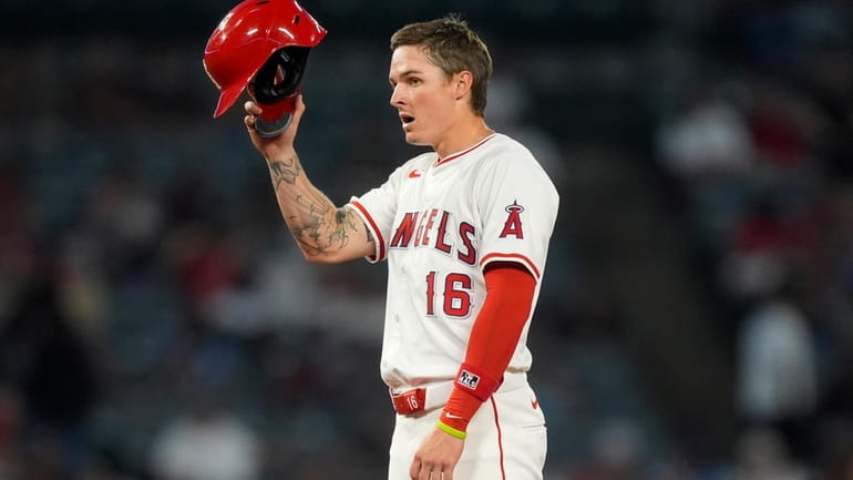 Los Angeles Angels' Mickey Moniak gestures after advancing to second...