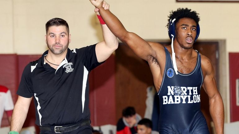 North Babylon’s Joel Lomax defeats Connetquot’s Connor D’Ambrosio in the...